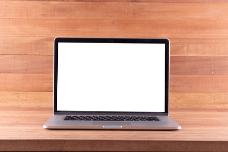 Laptop with blank screen on Wood backgroundの写真素材