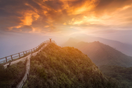 Tourist On the mountain of sunsetの写真素材