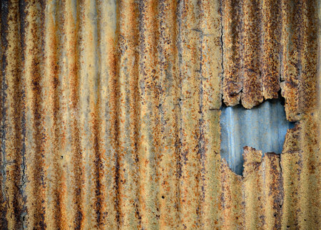 Rusty corrugated metal wall
