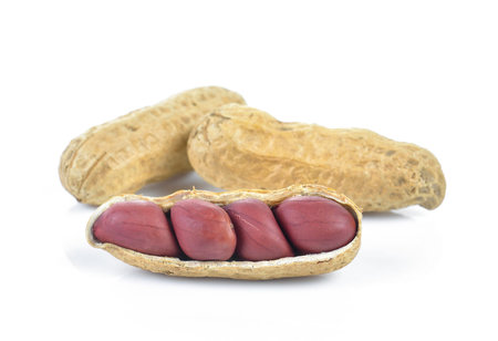 Dried peanuts on white background