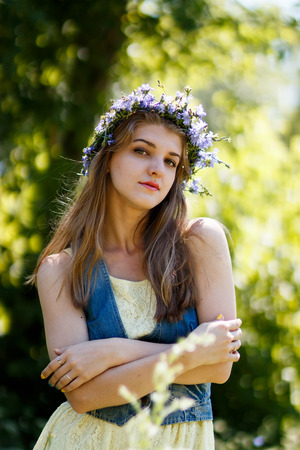 young blond female at summer natureの写真素材