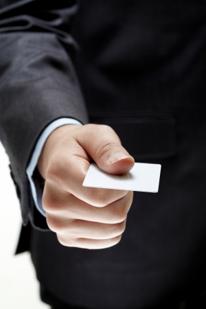 man hand with blank paperの写真素材
