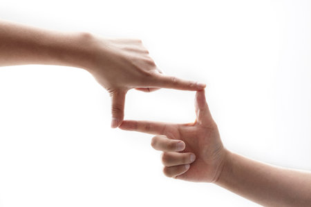 frame made of hands on white background
