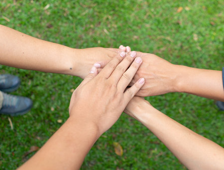 People are join hand together with trust and success in teamwork. Strong group of employee or friend...