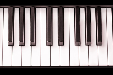 close-up of piano keys. close frontal view.の写真素材