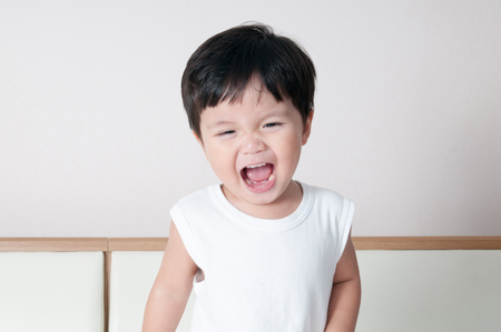 Smile asian toddler boy portraitの写真素材