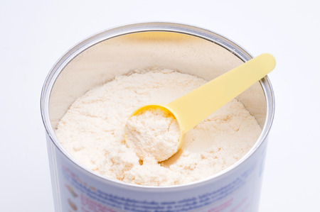 Baby milk powder in cans that open with a spoon.の写真素材