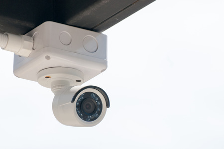 CCTV security cameras outside the white buildingの写真素材