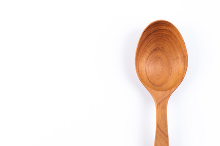 Wooden spoon on White backgroundの写真素材