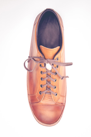 man leather brown shoes on white backgroundの写真素材