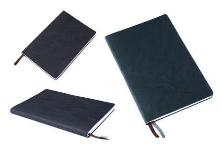 Black leather notebook isolated on white background. Include multiple views in a single image.の写真素材