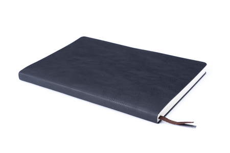 Black leather notebook isolated on white background. Lighting in the studioの写真素材