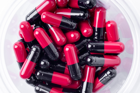 pile of medical pills and pills on backgroundの写真素材