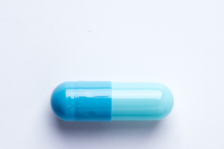 pills capsules isolated on white backgroundの写真素材