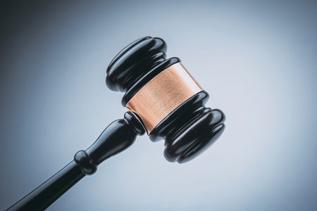 Black Judge Wood Hammer with blue background, gavel