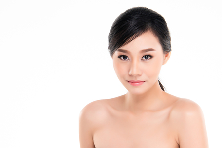 Beautiful Young asian Woman with Clean Fresh Skin look. Girl beauty face care. Facial treatment. Cosmetology, beauty and spa.の写真素材