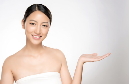 Beautiful Young asian Woman with Clean Fresh Skin look. Girl beauty face care. Facial treatment. Cosmetology, beauty and spa.の写真素材