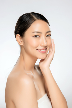 Beautiful Young asian Woman with Clean Fresh Skin look. Girl beauty face care. Facial treatment. Cosmetology, beauty and spa.の写真素材