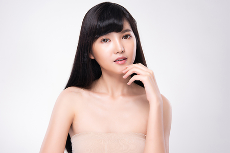 Beautiful Young asian Woman with Clean Fresh Skin. Face care . Facial treatment . Cosmetology, beauty and spa,の写真素材