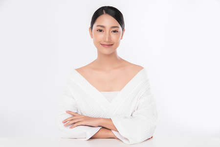 Beauty Woman face Portrait, Beautiful Young Asian Woman with Clean Fresh Healthy Skin, Facial treatment. Cosmetology, beauty and spa, isolated on white background.の写真素材