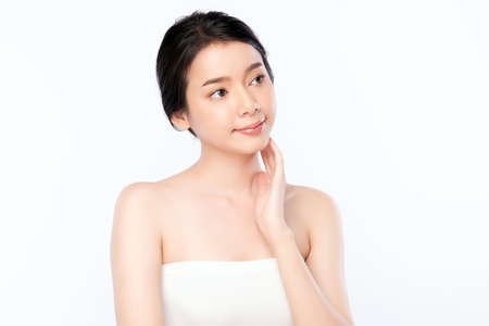 Beautiful Young asian Woman with Clean Fresh Skin, on white background, Face care, Facial treatment. Cosmetology, beauty and spa. Asian women portraitの写真素材