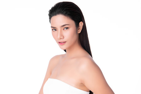 Beautiful Young asian Woman with Clean Fresh Skin, on white background, Face care, Facial treatment....