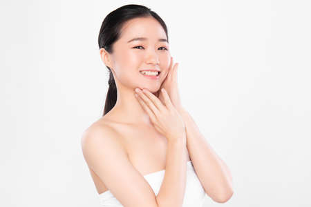 Beautiful young asian woman with clean fresh skin on white background, Face care, Facial treatment, Cosmetology, beauty and spa, Asian women portraitの写真素材
