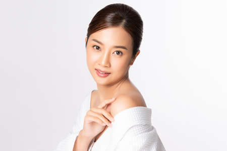 Beautiful young asian woman with clean fresh skin on white background, Face care, Facial treatment, Cosmetology, beauty and spa, Asian women portraitの写真素材