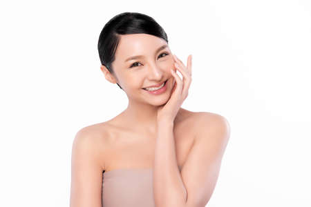 Beautiful young asian woman with clean fresh skin on white background, Face care, Facial treatment, Cosmetology, beauty and spa, Asian women portraitの写真素材