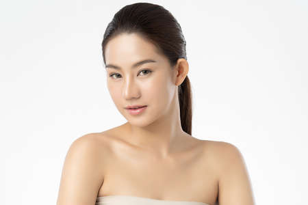Beautiful young asian woman with clean fresh skin on white background, Face care, Facial treatment, Cosmetology, beauty and spa, Asian women portraitの写真素材