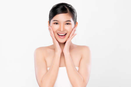 Beautiful young asian woman with clean fresh skin on white background, Face care, Facial treatment, Cosmetology, beauty and spa, Asian women portraitの写真素材