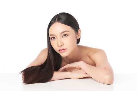 Beautiful young asian woman with clean fresh skin on white background, Face care, Facial treatment, Cosmetology, beauty and spa, Asian women portraitの写真素材