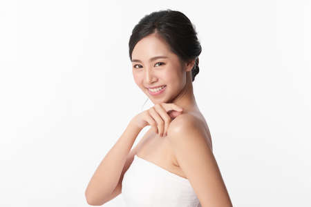 Beautiful young asian woman with clean fresh skin on white background, Face care, Facial treatment, Cosmetology, beauty and spa, Asian women portrait.の写真素材
