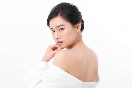 Beautiful young asian woman with clean fresh skin on white background, Face care, Facial treatment, Cosmetology, beauty and spa, Asian women portrait.の写真素材