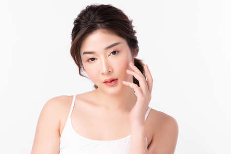 Beautiful young woman with clean fresh skin on white background, Face care, Facial treatment, Cosmetology, beauty and spa, Asian women portrait.の写真素材