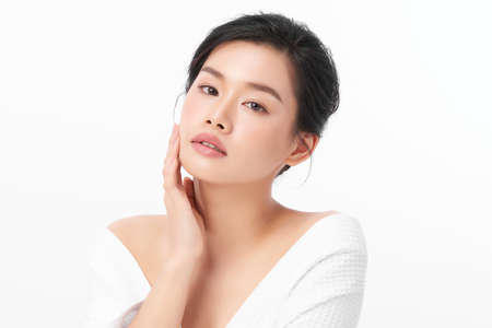 Beautiful young asian woman with clean fresh skin on white background, Face care, Facial treatment, Cosmetology, beauty and spa, Asian women portrait.の写真素材