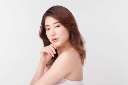 Beautiful young asian woman with clean fresh skin on white background, Face care, Facial treatment, Cosmetology, beauty and spa, Asian women portrait.の写真素材