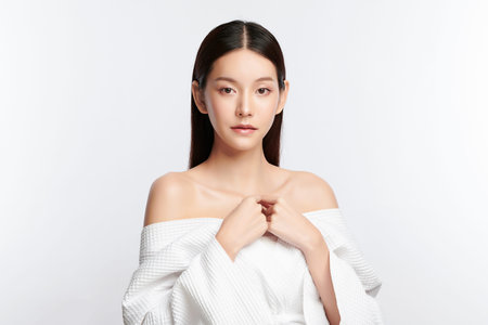 Beautiful young asian woman with clean fresh skin on white background, Face care, Facial treatment,...
