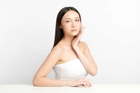 Beautiful young asian woman with clean fresh skin on white background, Face care, Facial treatment, Cosmetology, beauty and spa, Asian women portrait.の写真素材