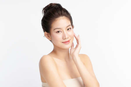 Beautiful young asian woman with clean fresh skin on white background, Face care, Facial treatment, Cosmetology, beauty and spa, Asian women portrait.の写真素材