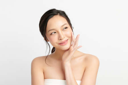 Beautiful young asian woman with clean fresh skin on white background, Face care, Facial treatment, Cosmetology, beauty and spa, Asian women portrait.の写真素材