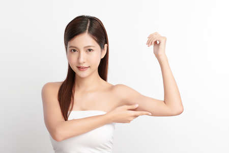 Beautiful young asian woman with clean fresh skin on white background, Face care, Facial treatment, Cosmetology, beauty and spa, Asian women portrait.の写真素材