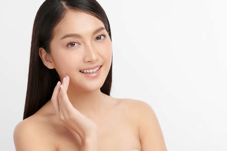 Beautiful young asian woman with clean fresh skin on white background, Face care, Facial treatment, Cosmetology, beauty and spa, Asian women portrait.の写真素材