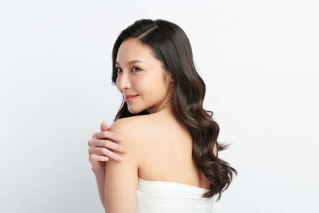 Beautiful young asian woman with clean fresh skin on white background, Face care, Facial treatment, Cosmetology, beauty and spa, Asian women portrait.の写真素材