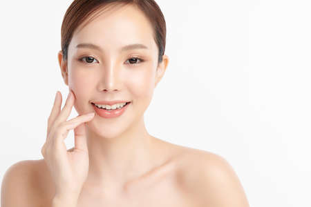 Beautiful young asian woman with clean fresh skin on white background, Face care, Facial treatment, Cosmetology, beauty and spa, Asian women portrait.の写真素材
