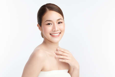 Beautiful young asian woman with clean fresh skin on white background, Face care, Facial treatment, Cosmetology, beauty and spa, Asian women portrait.の写真素材