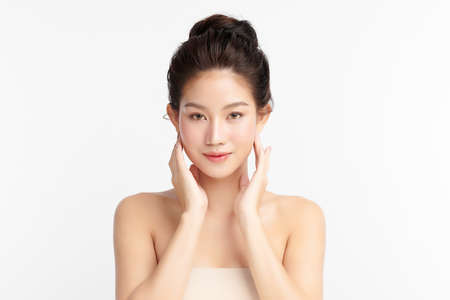 Beautiful young asian woman with clean fresh skin on white background, Face care, Facial treatment, Cosmetology, beauty and spa, Asian women portrait.の写真素材