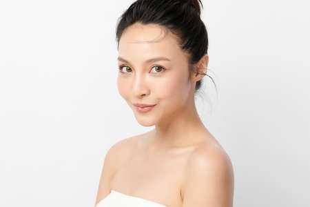 Beautiful young asian woman with clean fresh skin on white background, Face care, Facial treatment, Cosmetology, beauty and spa, Asian women portrait.の写真素材