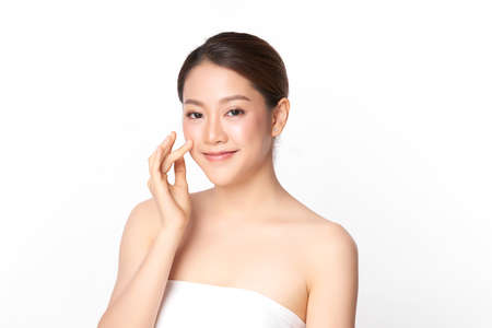 Beautiful young asian woman with clean fresh skin on white background, Face care, Facial treatment, Cosmetology, beauty and spa, Asian women portrait.の写真素材