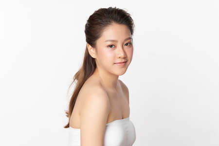 Beautiful young asian woman with clean fresh skin on white background, Face care, Facial treatment, Cosmetology, beauty and spa, Asian women portrait.の写真素材